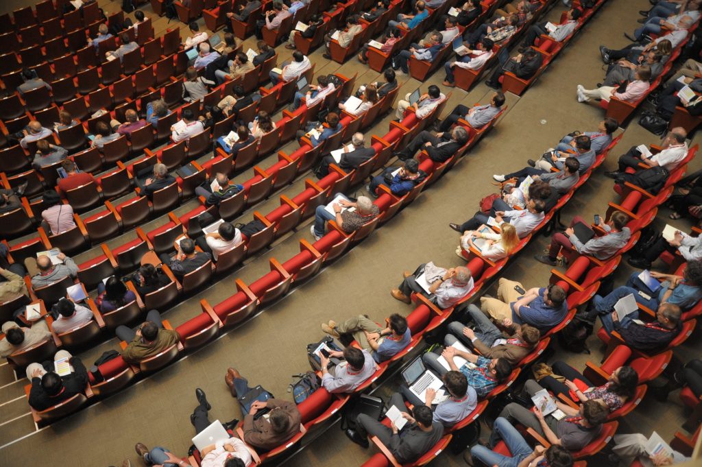 Auditorium filled with people